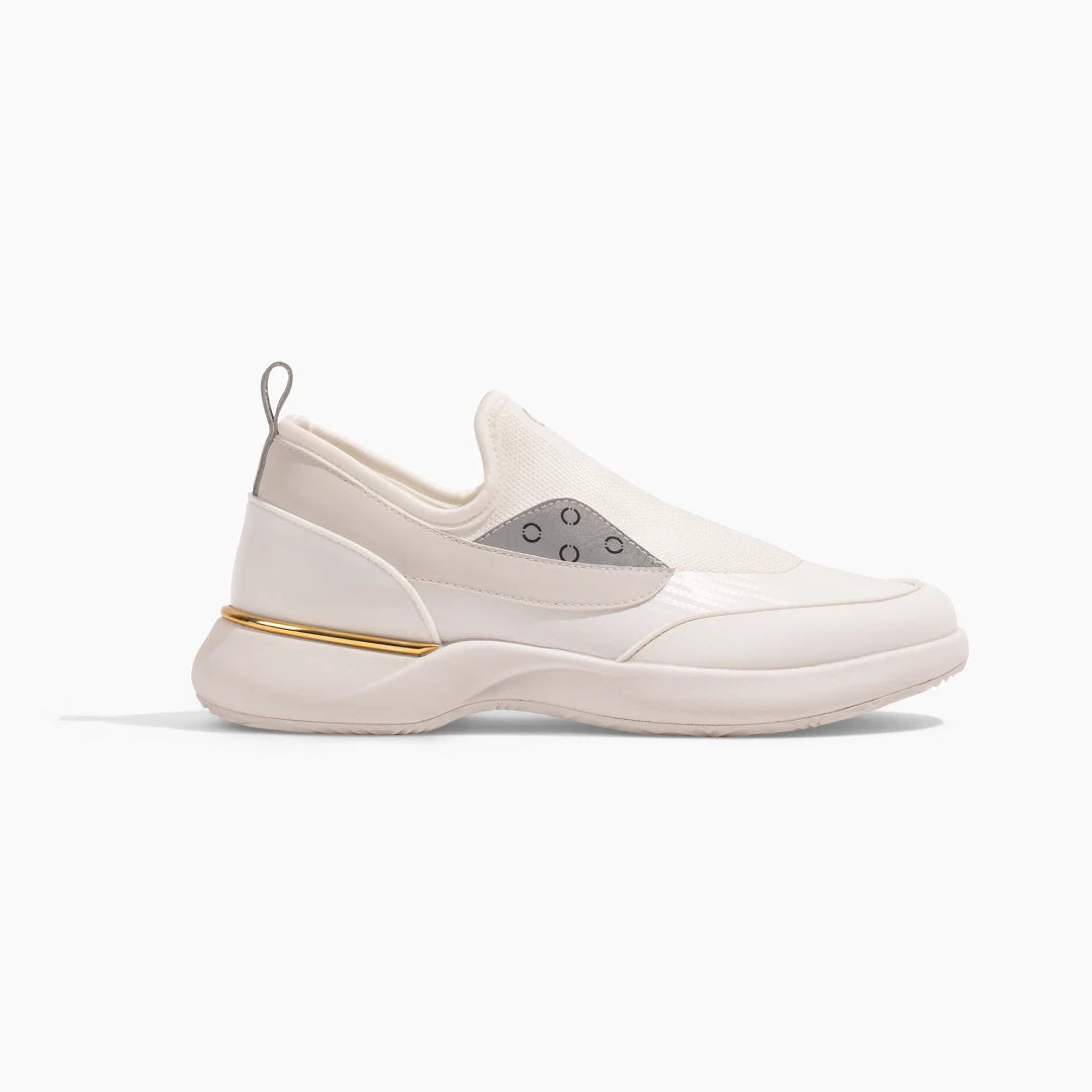 Snogs Genesis Day Shift white slip-on sneaker with gold accent stripe, side view